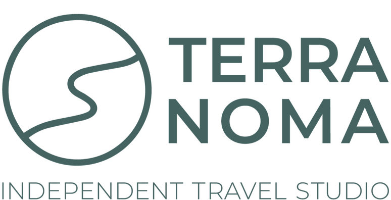 Terra Noma logo in olive with minimalist path mark, symbolising refined, intentional travel experiences